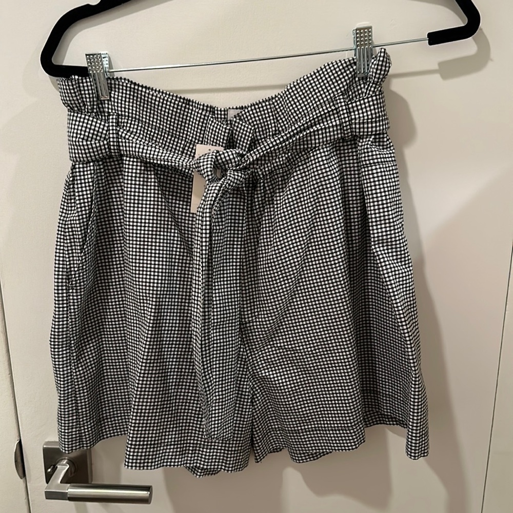 Brand New Belted Shorts. Tag attached. Size M. Black and white checkered.